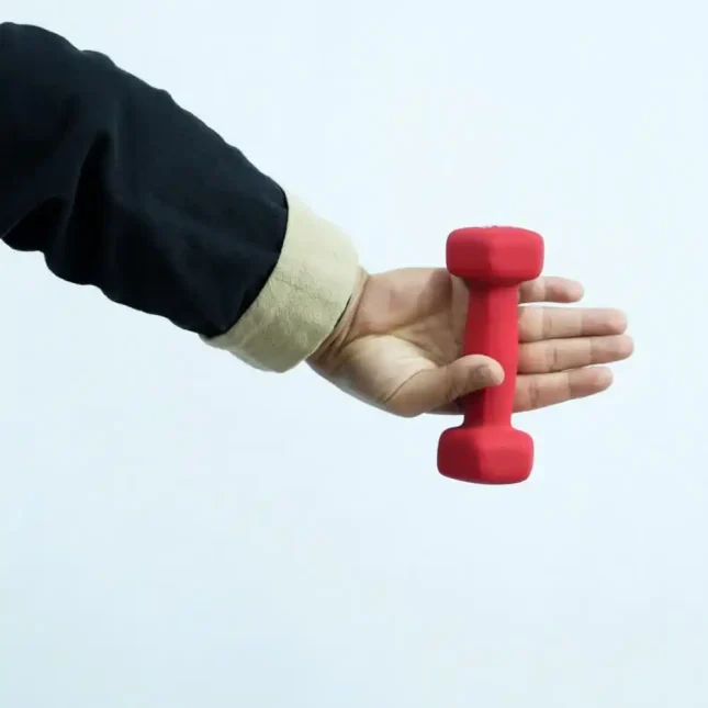 Close-up of the ergonomic design of a Wing Chun dumbbell, highlighting comfort and grip support.