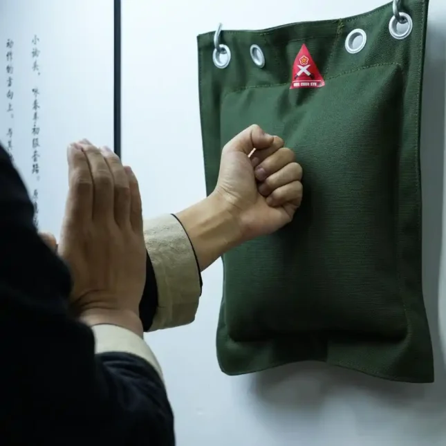 Wing Chun sandbag in use for martial arts training.