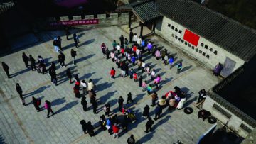 A group of people training Wing Chun at a training camp