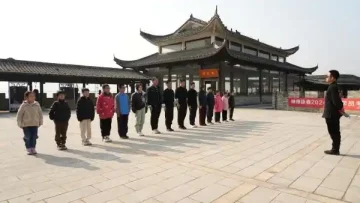 Wing Chun training camp with students practicing traditional kung fu techniques under expert guidance
